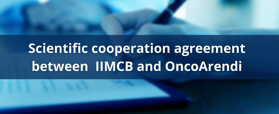 photo of hand which write and text scientific cooperation between IIMCB and OncoArendi